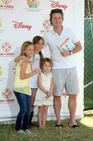Billy Bush and his children arriving at A Time For Heroes Celebrity Carnival benefiting the Elizabeth Glaser Pediatrics AIDS Foundation at the Wadsworth Theater Grounds in Westwood , CA on June 7, 2009 photo