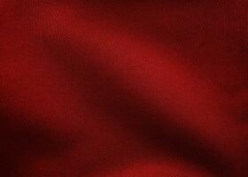 close-up of canvas texture for background and design , wrinkled pattern of  red fabric. photo