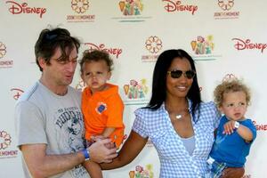 Garcelle Beauvais-Nilon and Family arriving at A Time For Heroes Celebrity Carnival benefiting the Elizabeth Glaser Pediatrics AIDS Foundation at the Wadsworth Theater Grounds in Westwood , CA on June 7, 2009 photo