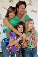 Lisa Rinna, Harry Hamlin, and daughters arriving at the A Time For Heroes Celebrity Carnival benefiting the Elizabeth Glaser Pediatrics AIDS Foundation at the Wadsworth Theater Grounds in Westwood , CA on June 7, 2009 photo