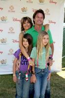 Lisa Rinna, Harry Hamlin, and daughters arriving at the A Time For Heroes Celebrity Carnival benefiting the Elizabeth Glaser Pediatrics AIDS Foundation at the Wadsworth Theater Grounds in Westwood , CA on June 7, 2009 photo