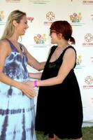 Stacey Keibler and Rumer WIllis arriving at A Time For Heroes Celebrity Carnival benefiting the Elizabeth Glaser Pediatrics AIDS Foundation at the Wadsworth Theater Grounds in Westwood , CA on June 7, 2009 photo