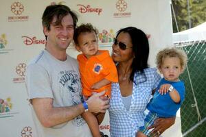 Garcelle Beauvais-Nilon and Family arriving at A Time For Heroes Celebrity Carnival benefiting the Elizabeth Glaser Pediatrics AIDS Foundation at the Wadsworth Theater Grounds in Westwood , CA on June 7, 2009 photo