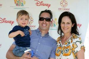 Annabeth Gish and husband and son arriving at A Time For Heroes Celebrity Carnival benefiting the Elizabeth Glaser Pediatrics AIDS Foundation at the Wadsworth Theater Grounds in Westwood , CA on June 7, 2009 photo