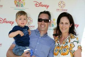 Annabeth Gish and husband and son arriving at A Time For Heroes Celebrity Carnival benefiting the Elizabeth Glaser Pediatrics AIDS Foundation at the Wadsworth Theater Grounds in Westwood , CA on June 7, 2009 photo