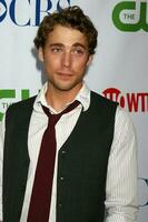 Dustin Milligan arriving at the CBS TCA Summer 08 Party at Boulevard 3 in Los Angeles CA on July 18 2008 2008 Kathy Hutchins Hutchins Photo