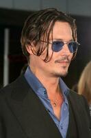 Johnny Depp arriving at the Public Enemies Premiere at the Manns Village Theater in Westwood CA on June 23 2009 2009 Kathy Hutchins Hutchins Photo