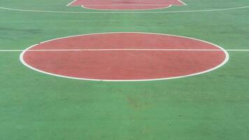 Basketball court line texture. Outdoor cement basketball hoop. photo