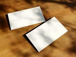 limpiar mínimo negocio tarjeta Bosquejo con el hojas sombra en madera mesa antecedentes foto