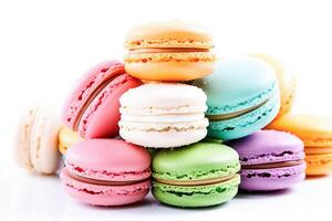 . Sweet and colourful french macaroons on white photo