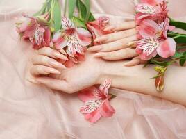 Elegant pastel pink natural manicure. photo