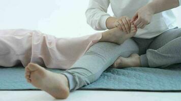 Hand making thai feet massage. Alternative medicine and thai massage concept video