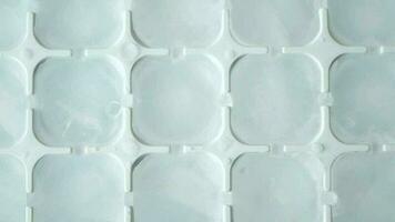 close up of many ice cubes on white background video