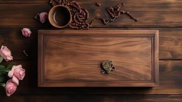 Closeup of Wooden Gift Box with Pink Roses, Beads and Drink Glass on Brown Rustic Table Top. . photo