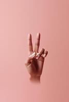 Human Hand Making a Peace Sign on Pastel Red Backgound, . photo