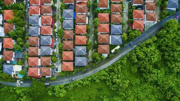 aerial view of beautiful home village plan with curve street and green environment photo