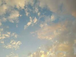 Evening sky scene with golden light from the setting sun. sky view on Lombok island, Indonesia photo