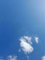 The white clouds on the blue sky are perfect for the background.  Skyscape on Lombok Island, Indonesia photo