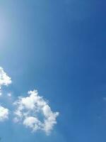 The white clouds on the blue sky are perfect for the background.  Skyscape on Lombok Island, Indonesia photo