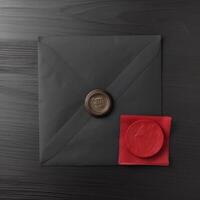 Red And Golden Wax Sealed Black Old Letter Envelopes on Table Top. . photo