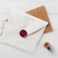 Flay Lay White and Brown Old Letter Envelopes with Red Wax Seal and Stamp on Table Top. . photo