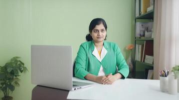 Photography of Professional Female Physician Sitting at Workplace with Laptop, . photo