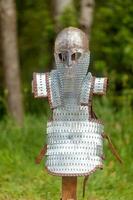 Viking helmet and its lamellar armor photo