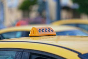 Yellow Russian taxi sign photo