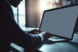 Closeup View of African Businessman Working on Laptop and sitting at Desk in Shiny Boardroom. Generative AI Illustration. photo