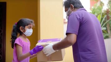 Side View Portrait of Middle Aged Indian Delivery Man Giving Cardboard Box to Customer Girl in Protective Mask at Doorstep, Generative AI. photo