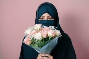 Portrait of Arabian Woman Wearing Mask and Holding Beautiful Bouquet, Generative AI. photo
