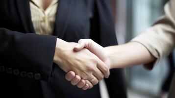 Business handshake between two women. Close up. Vertical Banner. . photo