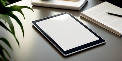 Digital tablet, blank screen mock up with papers, and pen on grey color table. photo