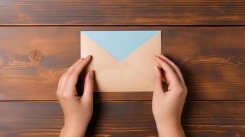 Top VIew Photo of Female Holding a Envelope Mockup, .