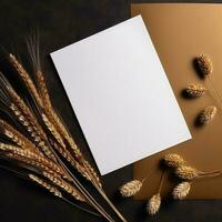 Top View of Blank White Paper with Golden Reeds Branch on Shiny Brown Background for Vintage Delicate Business or Wedding Card Design. Generative AI. photo