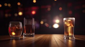 Cooled Glasses of Beer and Whisky on Wooden Table. Blurred Bokeh Background. . photo