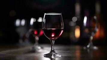 Cropped Shot of Wine Glasses on Wooden Table at Blur Lighting Background for Night Party. photo