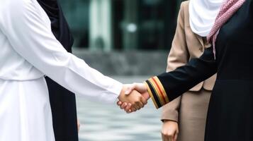 Cropped Image of Business Handshake Between Two Women Inside a Modern Bright Office. . photo