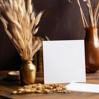 blanco blanco papel tarjeta Bosquejo con dorado grano, seco césped florero en de madera mesa, generativo ai. foto