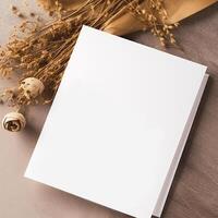 White Paper Card with Golden Floral Embossing Mockup, . photo