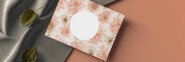 Top View of Floral Greeting Card Mockup and Crumpled Fabric on Brown Background, . photo