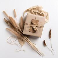 Top View of Rustic Style Packed Gift Box with Burlap Thread, Dried Grain Grass and Crumpled Kraft Paper on White Background, . photo