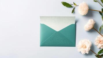 Overhead View of Green Embossed Greeting Card Envelope with Magnolia Flowers and Space for Message. Wedding or Event Celebration Concept. Generative AI. photo