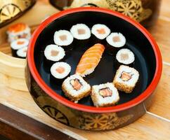 Japanese sushi on a rustic background. photo