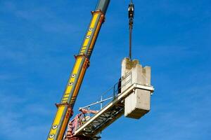 Disassembly of a tower crane photo