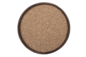 wheat grains seeds in rattan palm bowl Top view on isolated  background png