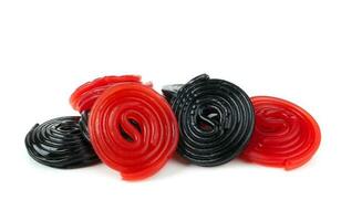 Red and black licorice wheels photo