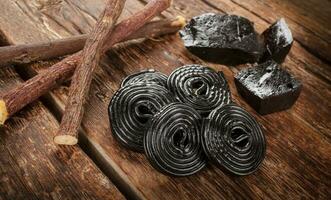 Production steps of licorice, roots, pure blocks and candy. photo