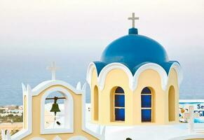 Traditional blue cupola in Santorini photo