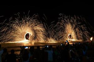 Amazing fire show on The beach at Sai Kaew Beach, Mu Koh Samed  ,Rayong ,Thailand photo